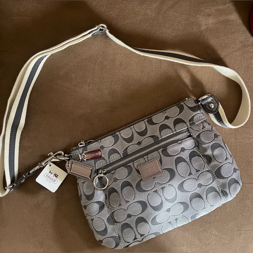 Coach Poppy Signature Crossbody Bag
NWT